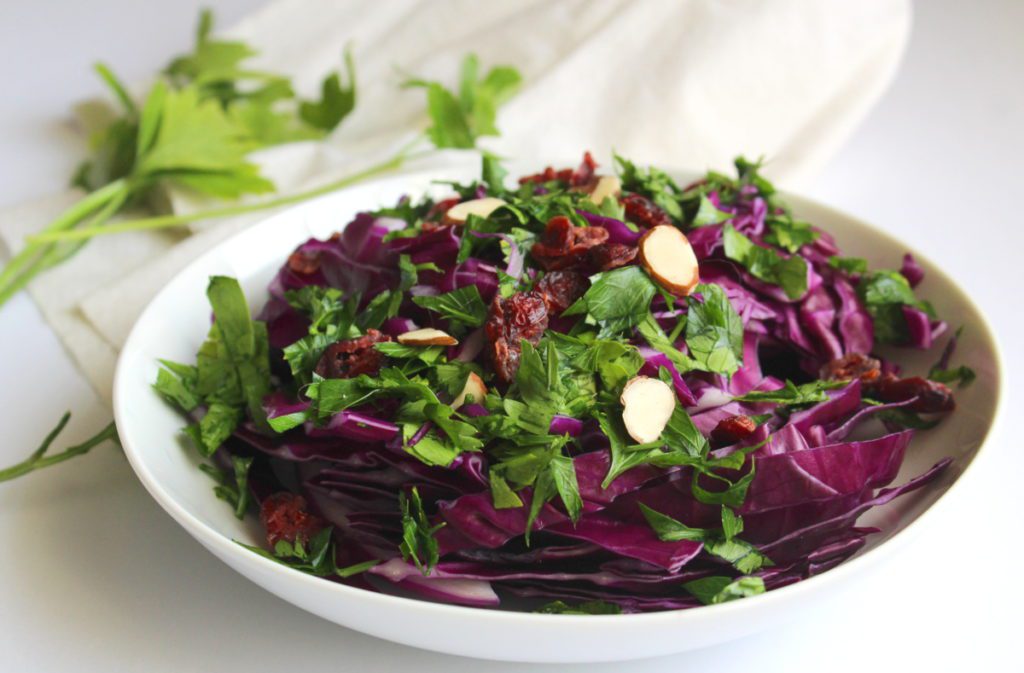 healthy thanksgiving slaw recipe in a white bowl