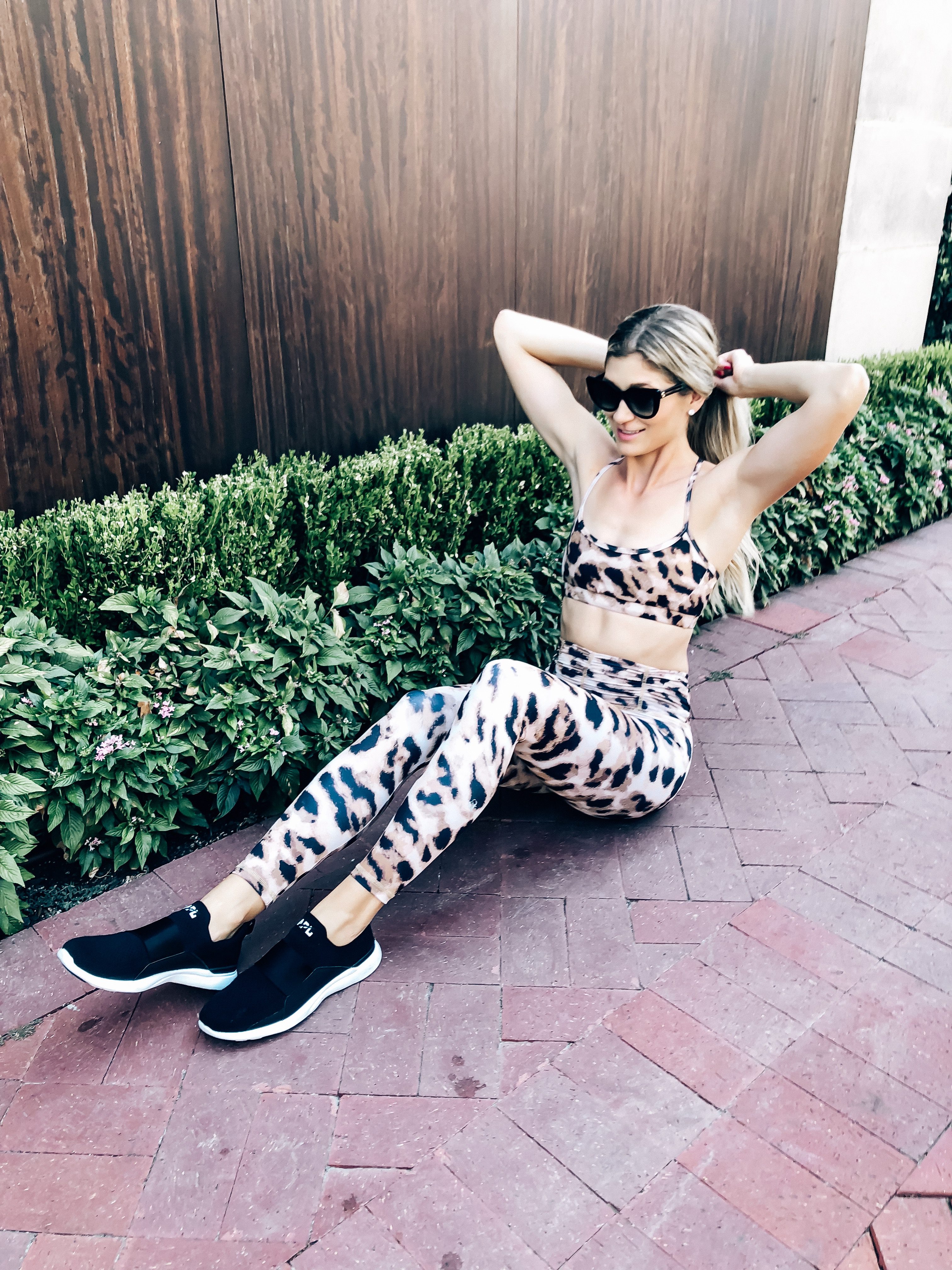 leopard workout leggings and sports bra strut this